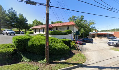 Dr. Eric M. Surat, DDS